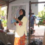 Women and youth presenting local mangrove products 